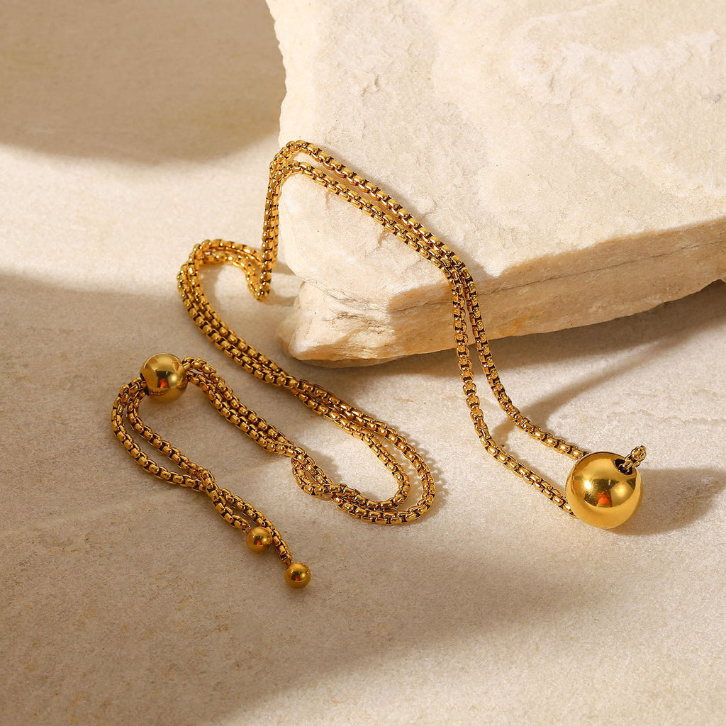 Uittrekbare schakelketting met bol-hanger, goudkleurig foto 3