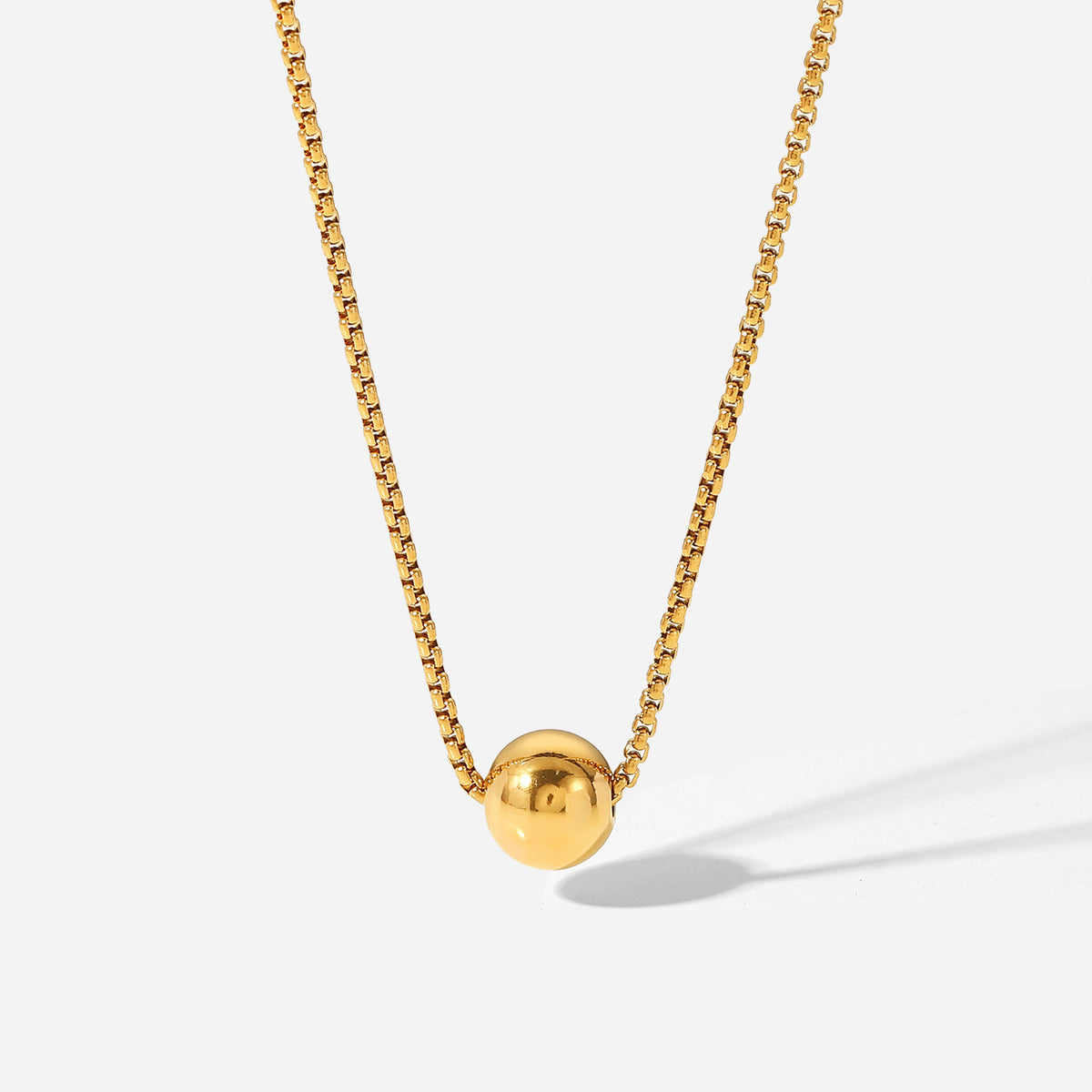 Uittrekbare schakelketting met bol-hanger, goudkleurig foto 1