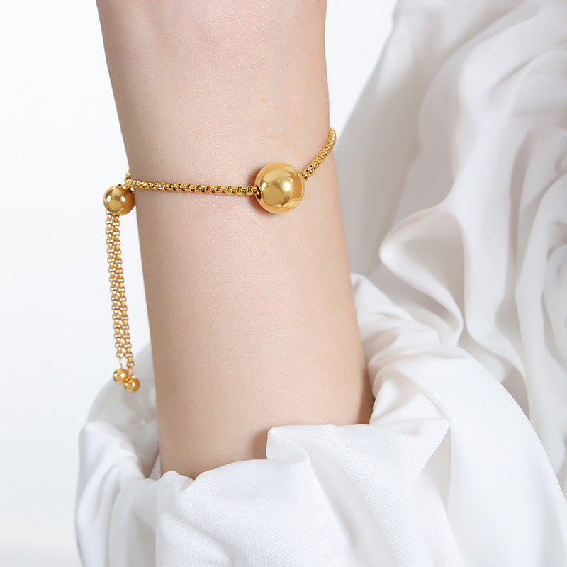 Uittrekbare schakelketting met bol-hanger, goudkleurig foto 4